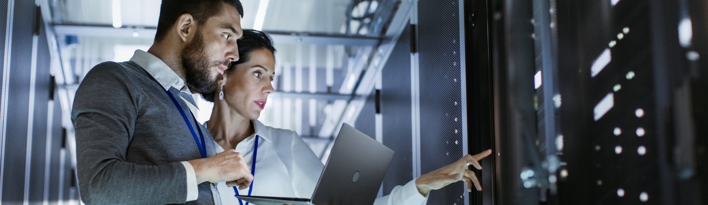 Man and woman in server room