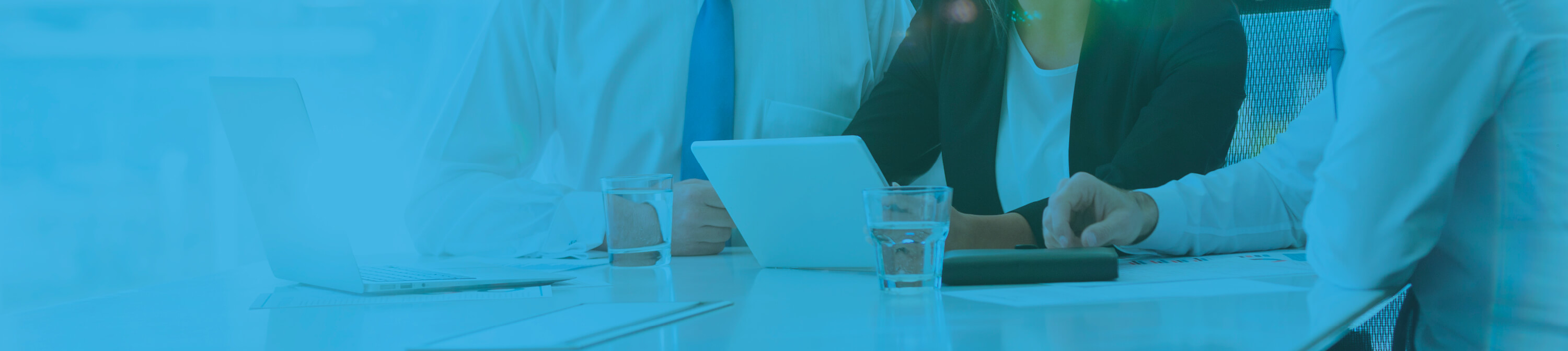 associates at table with laptop